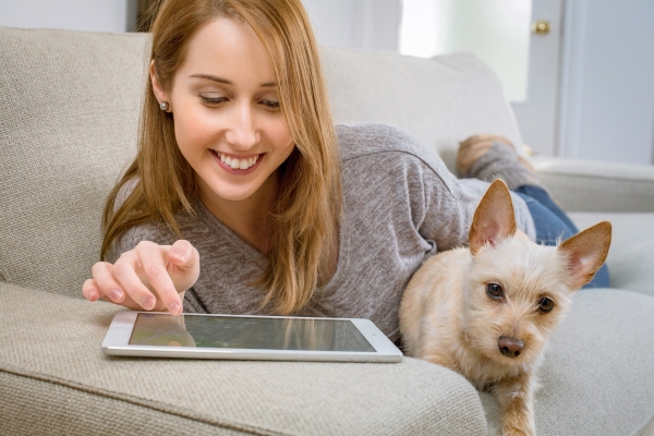 Lady on Tablet with Dog